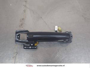 O202521 Gebruikte portiergreep 4deurs links-voor Suzuki SX-4