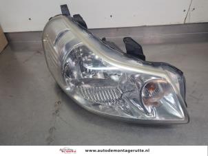 O202543 Gebruikte koplamp rechts Suzuki SX-4