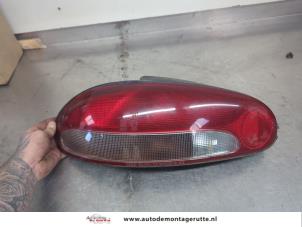 O202606 Gebruikte achterlicht links Mitsubishi Colt