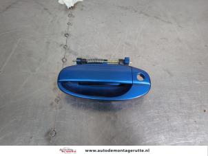 O202773 Gebruikte deurgreep 4deurs links-voor Chevrolet Aveo