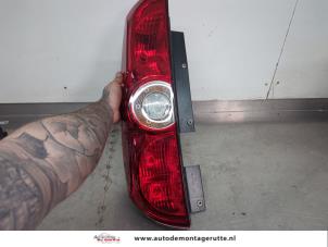 O202884 Gebruikte achterlicht links Opel Combo