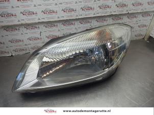 O203050 Gebruikte koplamp links Skoda Fabia