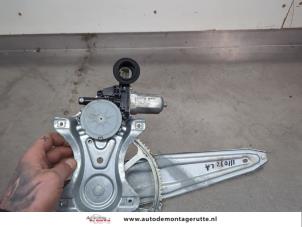 O203102 Gebruikte raammechaniek 4deurs links-achter Toyota Auris