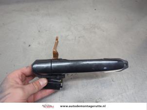 O203111 Gebruikte deurgreep 4deurs links-achter Toyota Auris