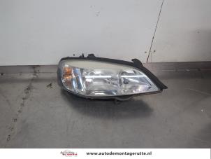 O203306 Gebruikte koplamp rechts Opel Astra