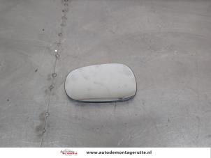 O203329 Gebruikte spiegelglas links Nissan Micra
