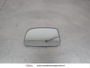 O203330 Gebruikte spiegelglas links Daihatsu Sirion