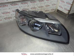 O203358 Gebruikte rechter koplamp Volvo S40
