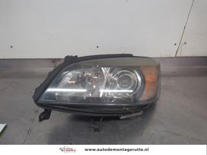 O203399 Gebruikte koplamp links Opel Zafira