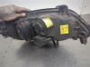 Gebruikte Koplamp links Opel Zafira O203399