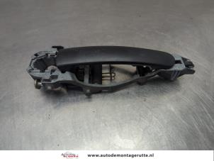 O203425 Gebruikte portiergreep 2deurs links Volkswagen Golf
