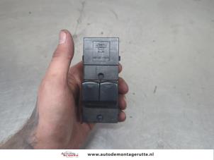 O203457 Gebruikte elektrisch raam schakelaar Nissan Micra