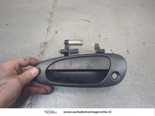 O203462 Gebruikte portiergreep 2deurs links Honda Civic