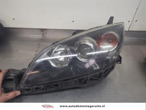O203477 Gebruikte koplamp links Mazda 3