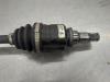 Gebruikte Aandrijfas links-voor Toyota Yaris O203501
