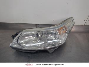O203535 Gebruikte koplamp links Citroen C4