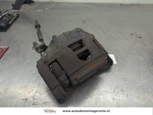 O203557 Gebruikte remklauw (tang) links-voor Audi A6