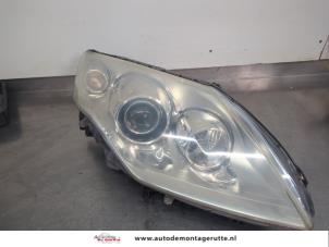 O203590 Gebruikte rechter koplamp Renault Laguna