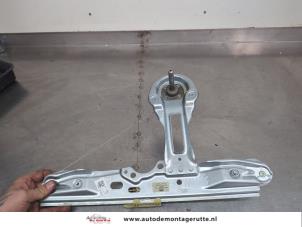 O203653 Gebruikte ruitmechaniek 4deurs links-achter Ford Focus