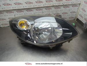 O203654 Gebruikte rechter koplamp Renault Twingo