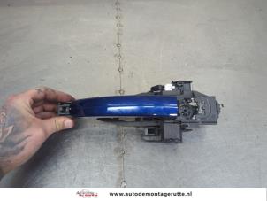 O203657 Gebruikte portiergreep 4deurs links-voor Ford Focus