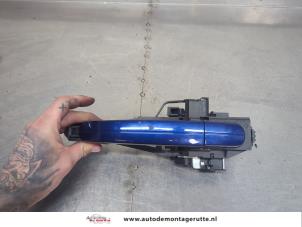 O203658 Gebruikte portiergreep 4deurs rechts-voor Ford Focus