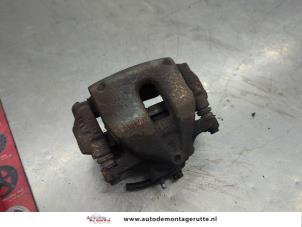 O203819 Gebruikte remklauw (tang) links-voor Toyota Auris