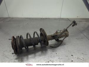 O203823 Gebruikte schokdemperpoot links-voor Toyota Auris