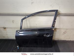 O203869 Gebruikte portier 4deurs links-voor Toyota Auris