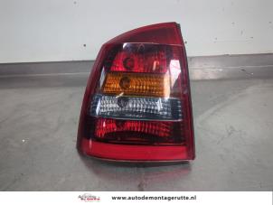 O203943 Gebruikte achterlicht links Opel Astra