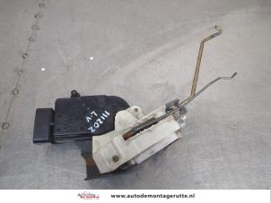 O203974 Gebruikte slotmechaniek portier 4deurs links-voor Suzuki Wagon R+