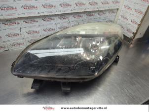O204001 Gebruikte linker koplamp Renault Scenic