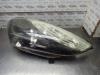 Gebruikte Linker Koplamp Renault Scenic O204001