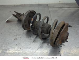 O204102 Gebruikte schokdemperpoot links-voor Mitsubishi Lancer