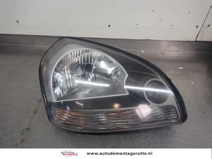 O204164 Gebruikte rechter koplamp Hyundai Tucson