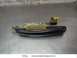 O204171 Gebruikte portiergreep 4deurs links-achter Hyundai Tucson