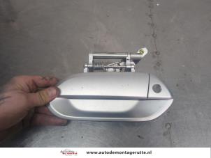 O204201 Gebruikte portiergreep 4deurs links-voor Honda Insight