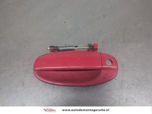O204259 Gebruikte portiergreep 2deurs links Chevrolet Aveo