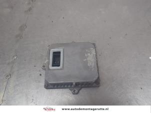 O204285 Gebruikte xenon module Volkswagen Golf