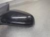 Gebruikte Buitenspiegel links Opel Astra O204306
