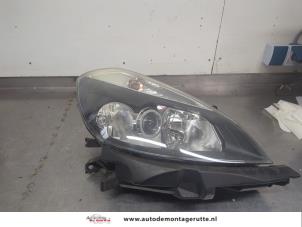 O204498 Gebruikte rechter koplamp Renault Clio