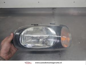 O204556 Gebruikte linker koplamp Suzuki Alto