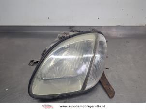 O204642 Gebruikte koplamp links Mercedes SLK