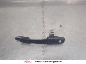O204653 Gebruikte portiergreep 4deurs links-voor Mazda 2