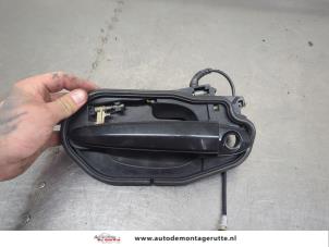 O204733 Gebruikte portiergreep 4deurs links-voor BMW X3