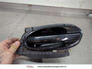 O204829 Gebruikte portiergreep 4deurs links-achter BMW 7-Serie