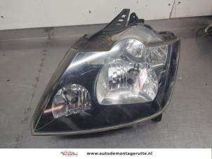 O204945 Gebruikte koplamp links Renault Modus