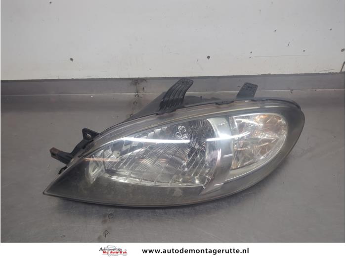 Gebruikte Koplamp links Chevrolet Lacetti O205028