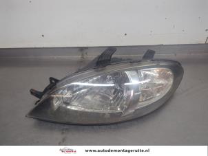 O205028 Gebruikte koplamp links Chevrolet Lacetti