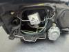 Gebruikte Koplamp links Renault Megane O205068
